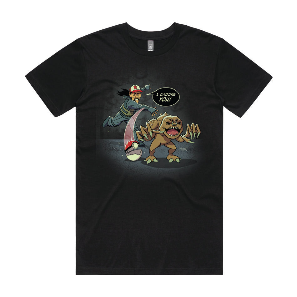 Front design of Danny Trejo throwing Pokeball choosing Rancor printed on Black T-Shirt - Geekdom Tees - E-commerce